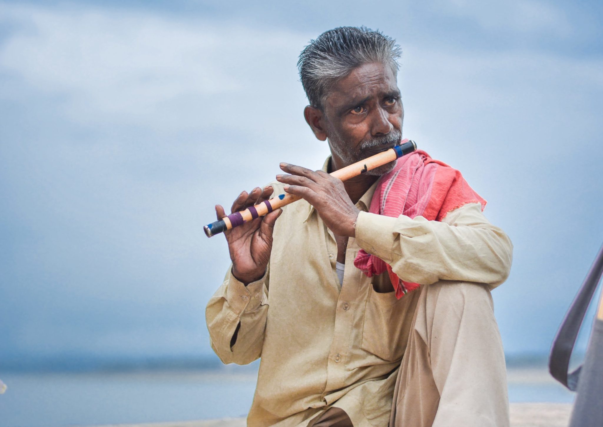 Man Playing Flute