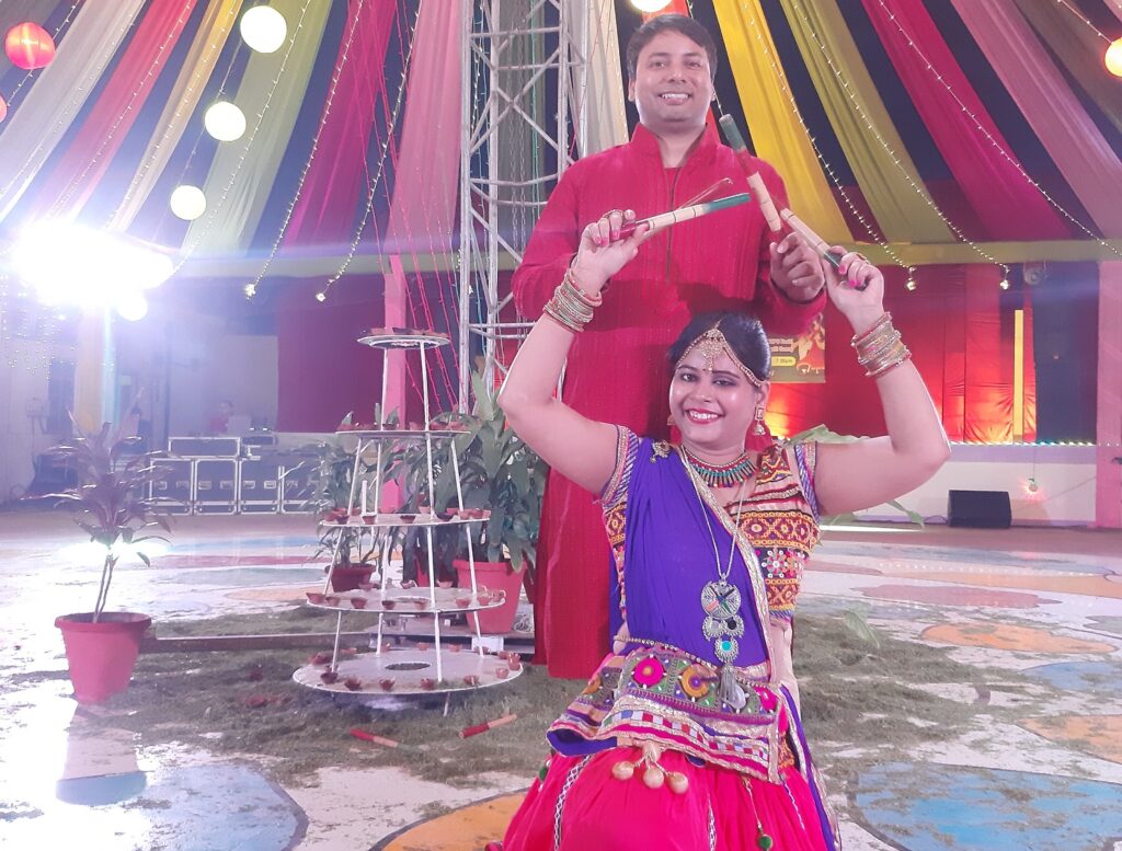 A Couple Doing Garba Dance